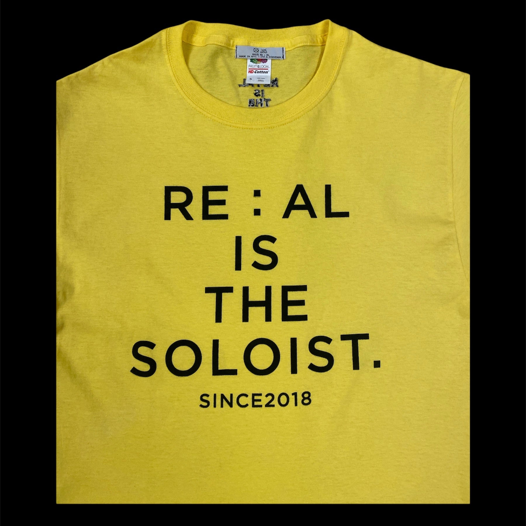 RE:AL IS THE SOLOIST "100% RE:AL" I'M A SOUVENIR T-SHIRT